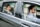 businesswoman-sitting-on-back-seat-in-taxi-car-talking-on-the-phone-