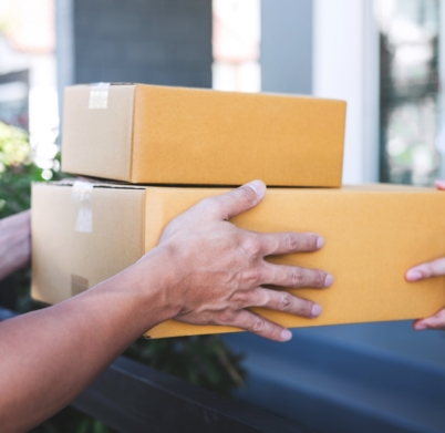 delivery-mail-man-giving-parcel-box-to-recipient